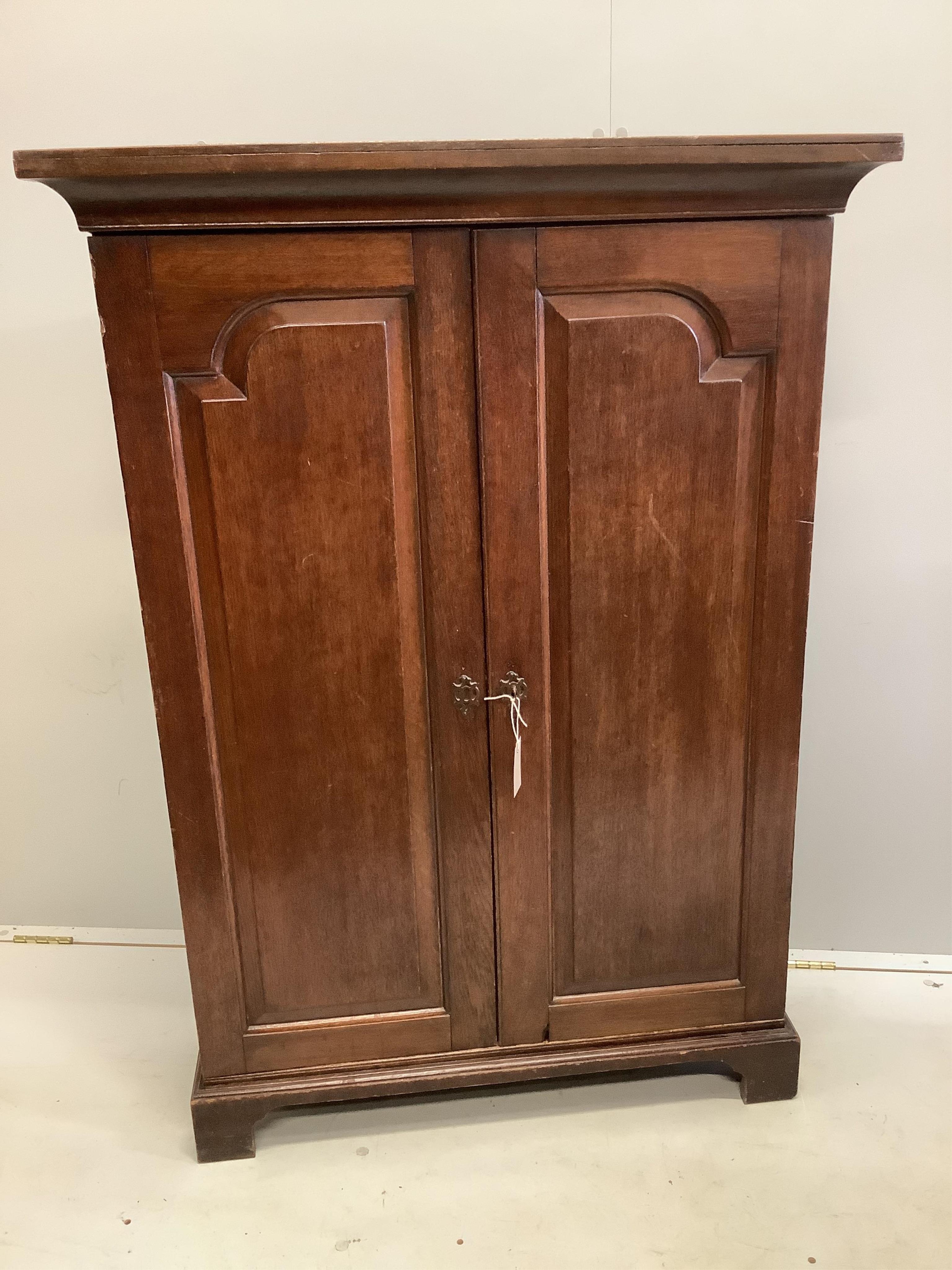 A George III oak two door cabinet, adapted, width 92cm, depth 30cm, height 129cm